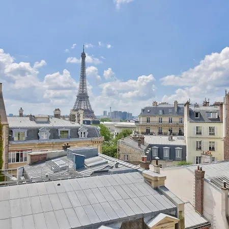 With A Panoramic View Of The Eiffel Tower *